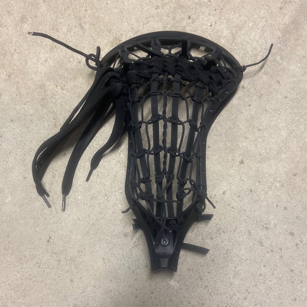Brine Houdini X blacked out lacrosse head with traditional pocket